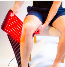 Load image into Gallery viewer, Chronic knee pain ankle pain neuropathy novaa plantar fasciitis tendinitis cartilage damage bone on bone heating pad drug free acl mcl patella pain tendon relief red light therapy pad wrap post surgical pain sports injuries novalab